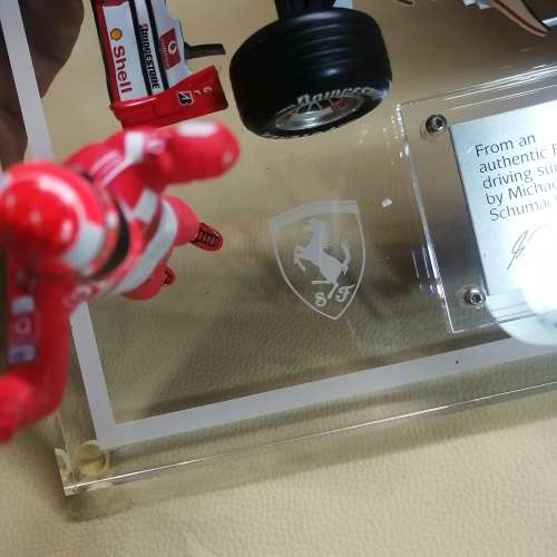 Certified Limited Michael Schumacher Ferrari F1 F2004 and Original Racing Suit Piece - Hot Wheels