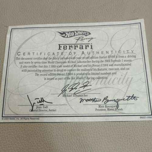 Certified Limited Michael Schumacher Ferrari F1 F2004 and Original Racing Suit Piece - Hot Wheels