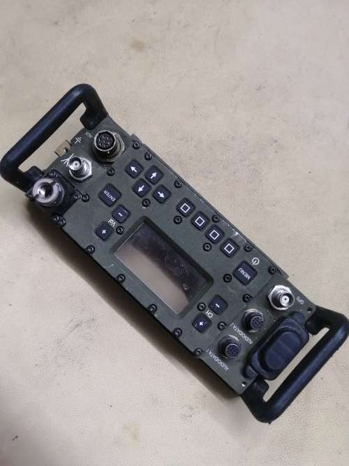 FRONT FACE OF A VINTAGE MILITARY RADIO