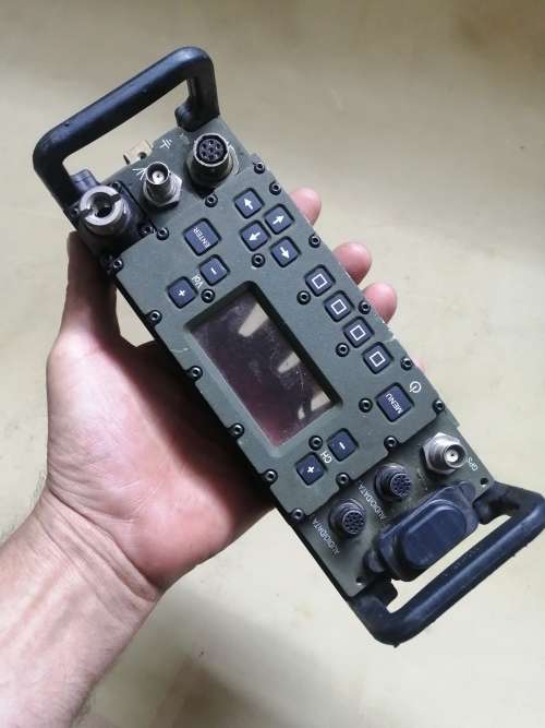 FRONT FACE OF A VINTAGE MILITARY RADIO