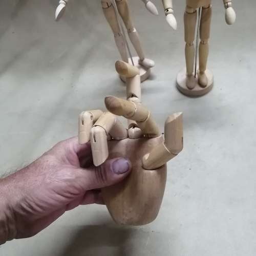 GROUP OF ARTICULATED ARTISTS WOODEN MANNEQUINS