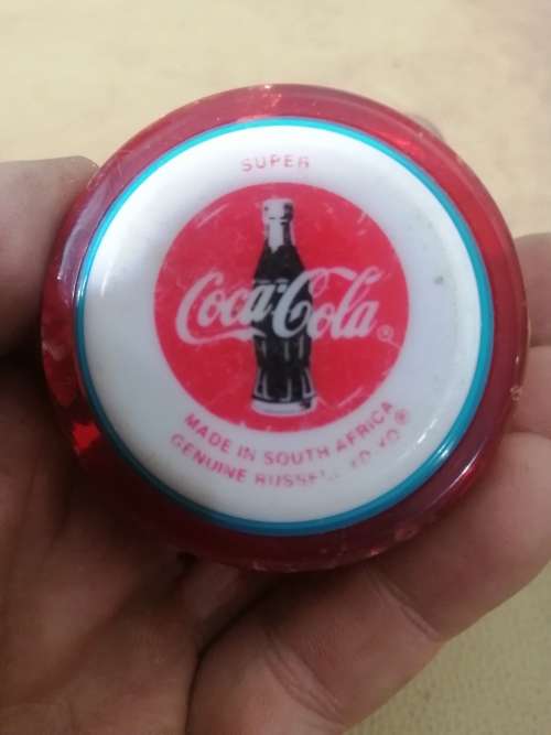 VINTAGE COKE RUSSELL YOYO - 6 OF 7 YOYOS ON AUCTION