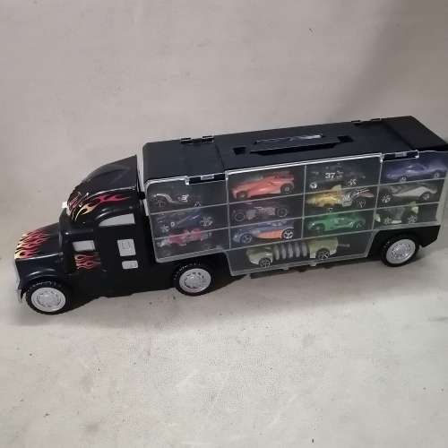 HUGE HOT WHEELS STORAGE TRUCK FILLED ON BOTH SIDES WITH HIGHLY COLLECTIBLE HOT WHEELS CARS