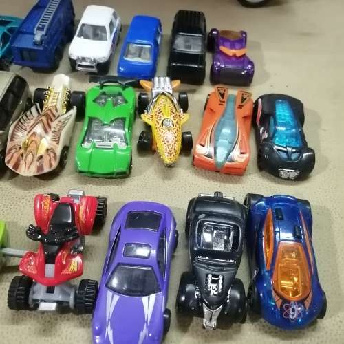 HUGE HOT WHEELS STORAGE TRUCK FILLED ON BOTH SIDES WITH HIGHLY COLLECTIBLE HOT WHEELS CARS