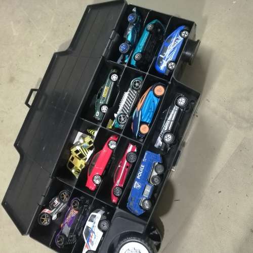HUGE HOT WHEELS STORAGE TRUCK FILLED ON BOTH SIDES WITH HIGHLY COLLECTIBLE HOT WHEELS CARS