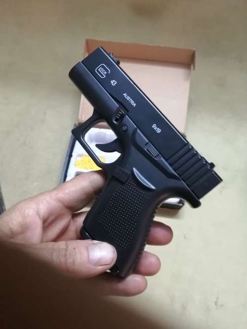 GLOCK 43 WITH SILENCER - ZINC ALLOY SHELL AIRSOFT GUN COMPLETE IN BOX