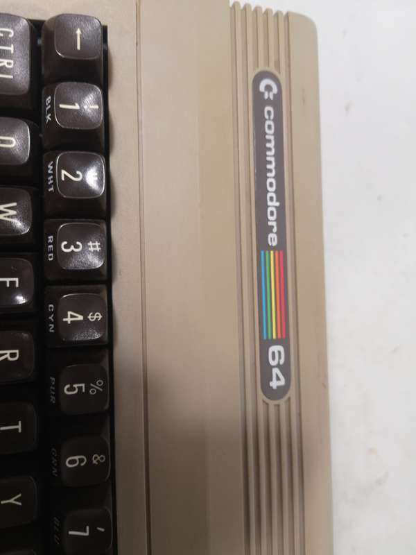 Super Collectable!! Commodore 64 computer, Power Supply, Original Cartridge & Gaming Tapes (Working)