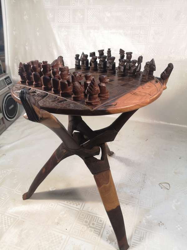 Hand Carved Tribal Chess Set on a Double sided Tri-Leg Coffee Table