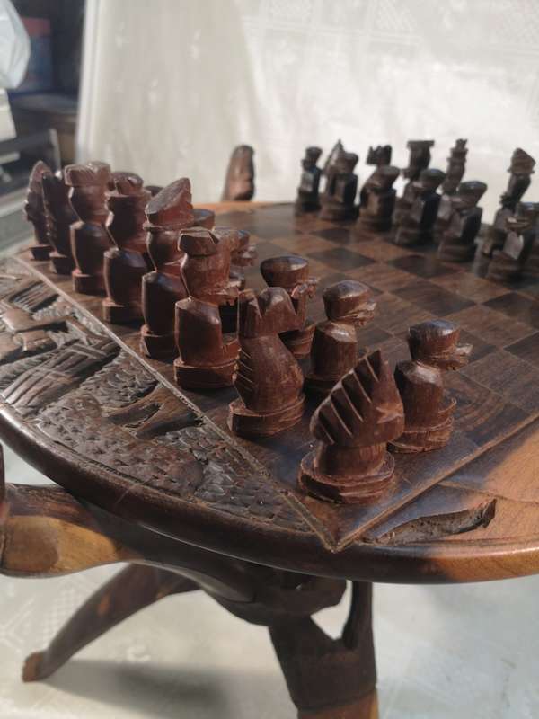 Hand Carved Tribal Chess Set on a Double sided Tri-Leg Coffee Table