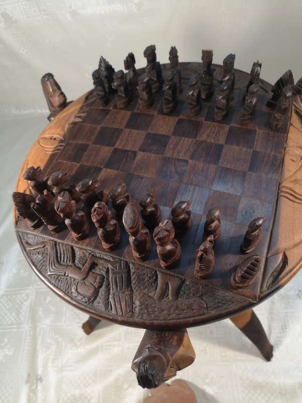 Hand Carved Tribal Chess Set on a Double sided Tri-Leg Coffee Table