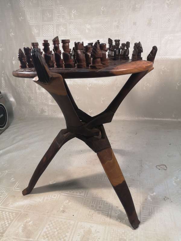 Hand Carved Tribal Chess Set on a Double sided Tri-Leg Coffee Table