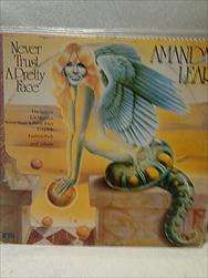 Amanda Lear : Never Trust a Pretty Face : LP In VG Condition