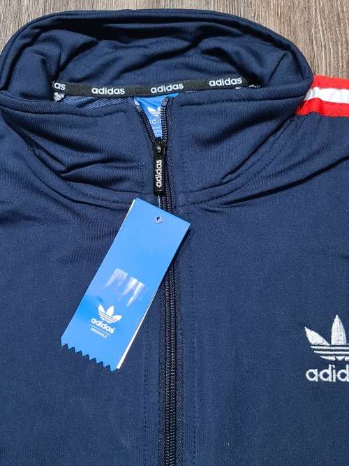 NEW UNISEX  MEDIUM TRACKSUIT (SEE DESCRIPTION)