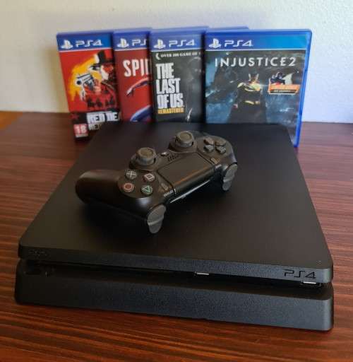 Play Station PS4 1TB + 4 Games (Like New)