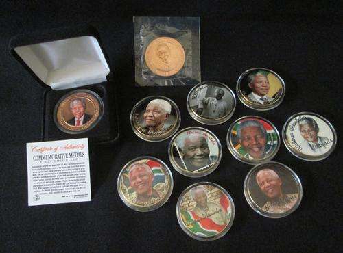 Collection of 11 Mandela Medallions   STARTING @ R1 ---  ONE BID FOR THE LOT