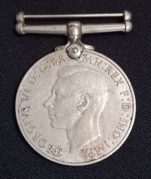 1939 - 1945 The Defence Medal C 168125 W.J. SWARTZ           M18