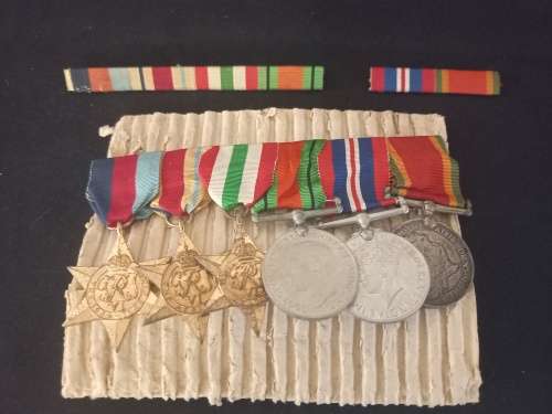 WW2 Medal Group, Insignia and Documents Awarded To: 158401 PTE. (GUNNER)  K.W. COTTERRELL