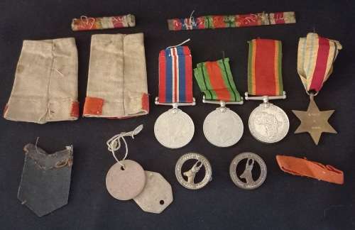 WW2 Medal Group and Insignia   Awarded To :   M.19002 D. ADAMS