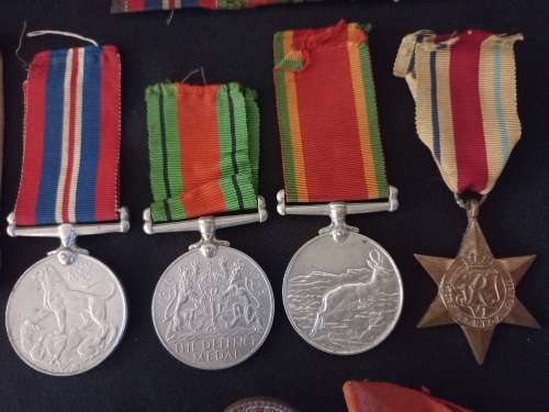 WW2 Medal Group and Insignia   Awarded To :   M.19002 D. ADAMS