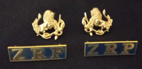 Zimbabwe Police Badges And Zimbabwe Republic Shoulder Titles           X39