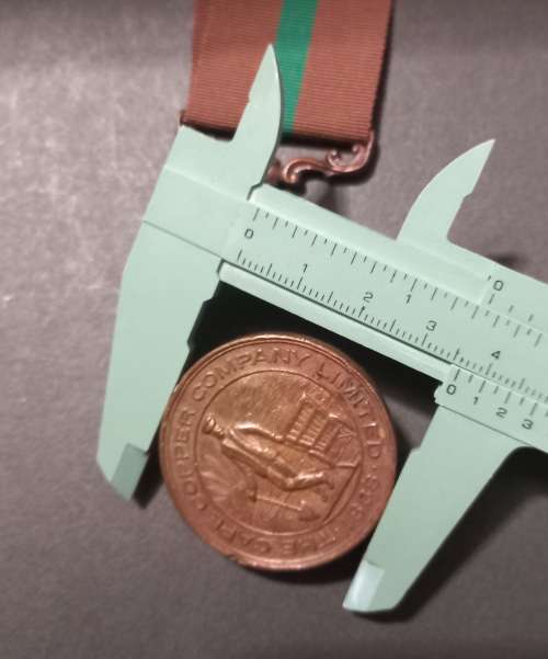 Defence Of O`OKIEP   Medal  Awarded To: J. JOSEPH. ( Please Note Suspender Is Broken Off )