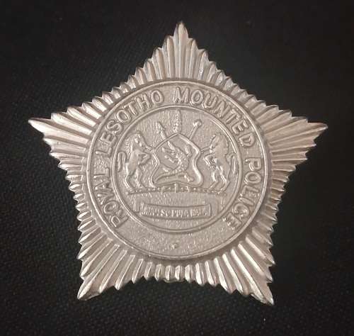 ROYAL LESOTHO MOUNTED POLICE CAP BADGE                           F55