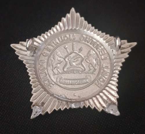 ROYAL LESOTHO MOUNTED POLICE CAP BADGE                           F55