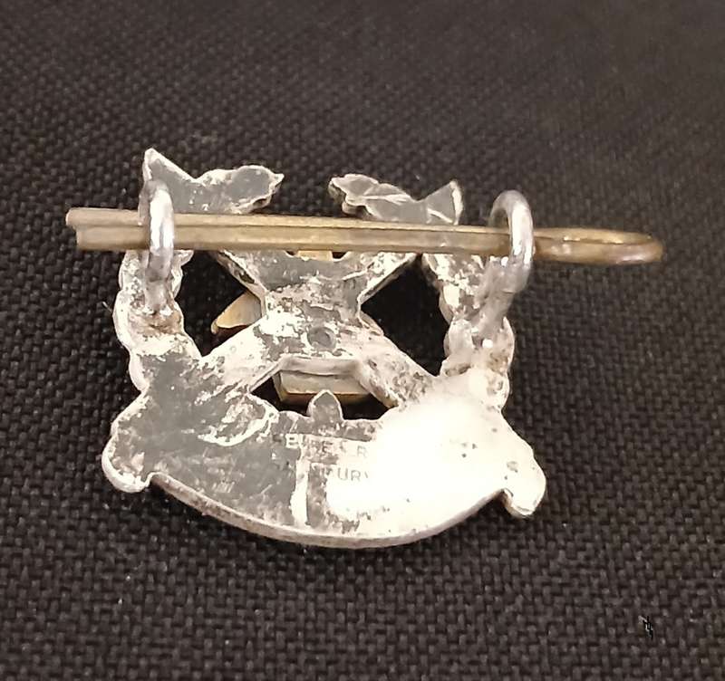 ZIMBABWE MILITARY BADGE   `` MAKERS MARK REUTELER SALISBURY ``   Size:  23MM X 25MM      V93