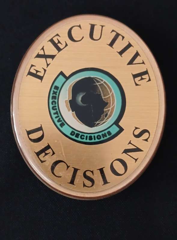 EXECUTIVE DECISIONS BADGE                                   V103