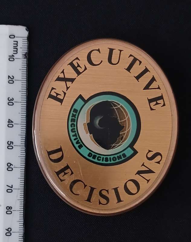 EXECUTIVE DECISIONS BADGE                                   V103