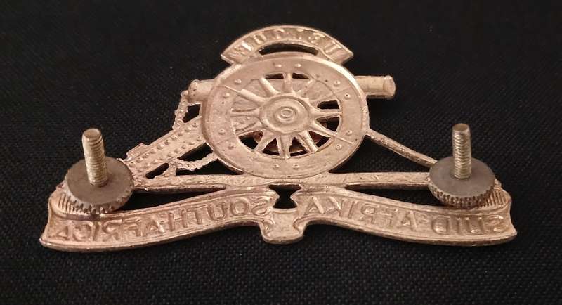 REGIMENT PRETORIA UNIVERSITY ARTILLERY CAP BADGE            C52