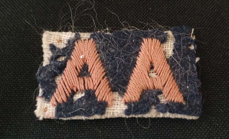 WW2 AA EMBROIDERED CLOTH BADGE ANTI AIRCRAFT   ( NOTE ` MOTH DAMAGE )        C74