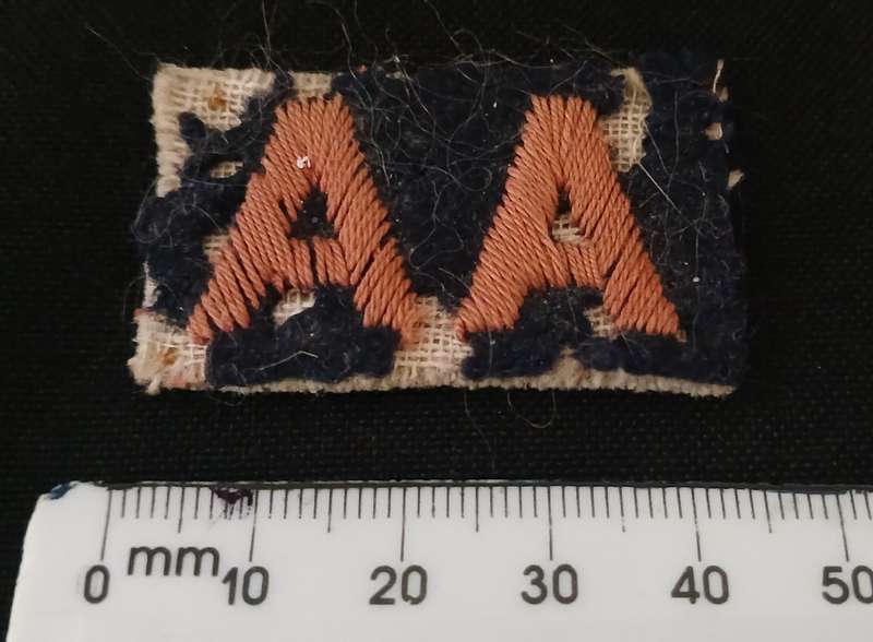 WW2 AA EMBROIDERED CLOTH BADGE ANTI AIRCRAFT   ( NOTE ` MOTH DAMAGE )        C74
