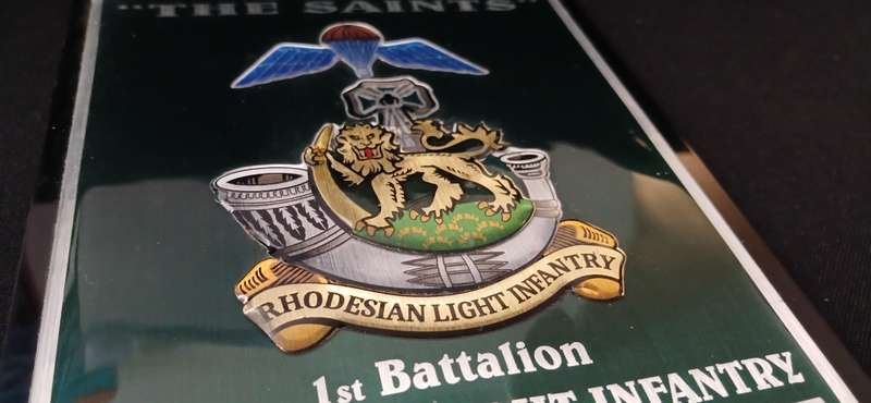 RHODESIAN LIGHT INFANTRY 1ST BATTALION ` THE SAINTS ` PLAQUE WITH 5 SHIELDS           No.1
