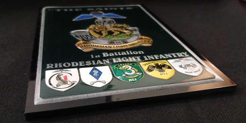 RHODESIAN LIGHT INFANTRY 1ST BATTALION ` THE SAINTS ` PLAQUE WITH 5 SHIELDS           No.1