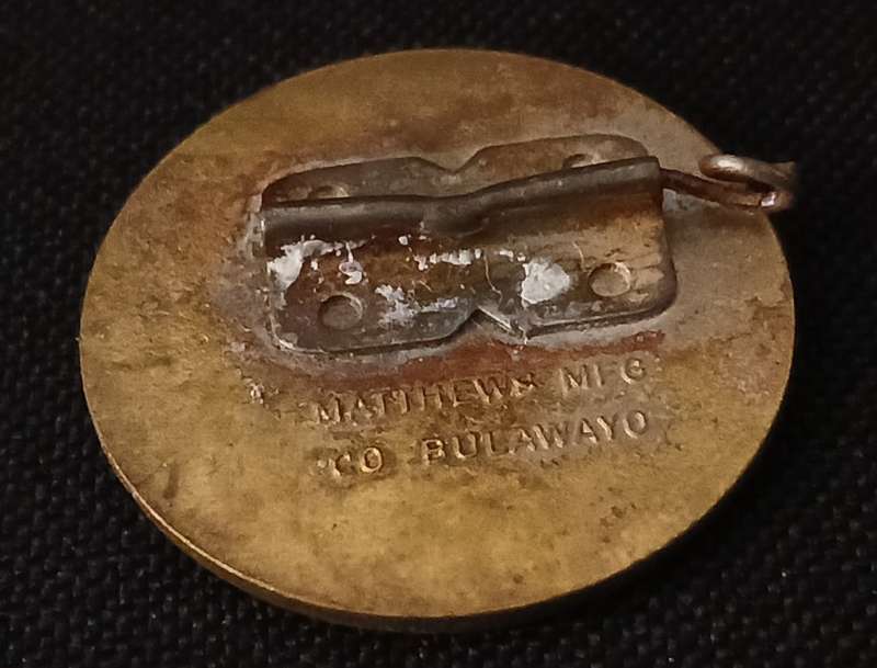 BULAWAYO 75TH ANNIVERSARY PIN BADGE   ( NOTE PIN BROKEN OFF )    R98
