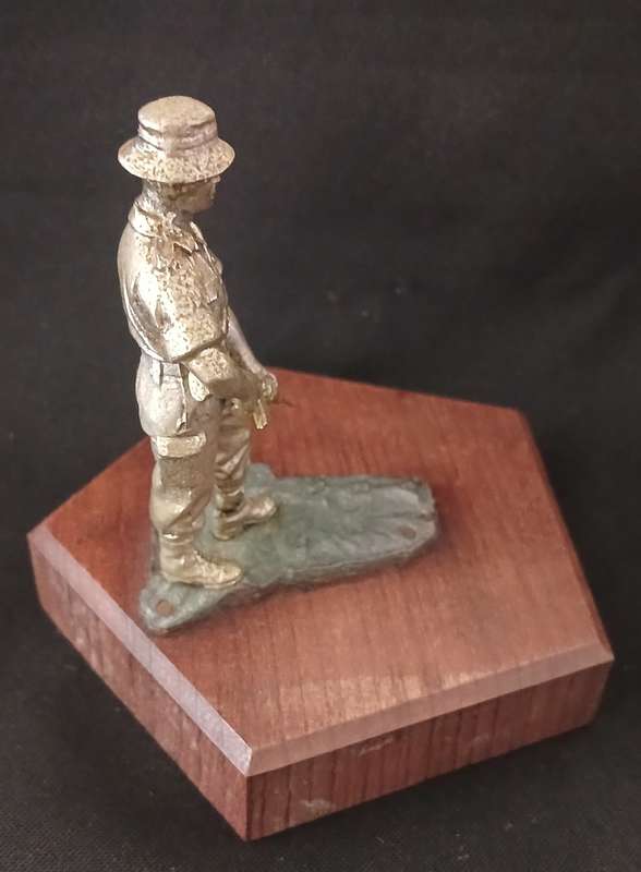 SA BORDER WAR  TROOPIE STATUETTE ON A WOODEN BASE  -- SWA NAMIBIA        ( Weight: 250 grams )