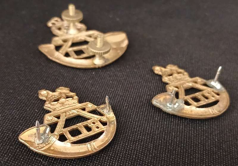 South African Rand Light Infantry Cap and Collar Badges       L26