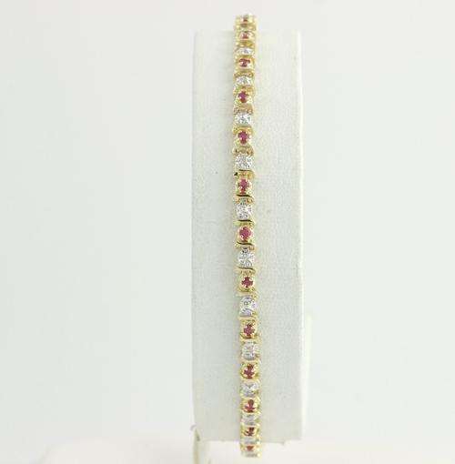 TENNIS BRACELET 10K YELLOW AND WHITE GOLD 8 INCHES LONG RUBY AND DIAMONDS  WOW!! A BEAUTY!