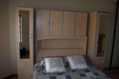 Headboard + cupboard + drawers + mirrors and closet space