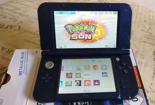 New Nintendo 3DS XL in box with 10 games