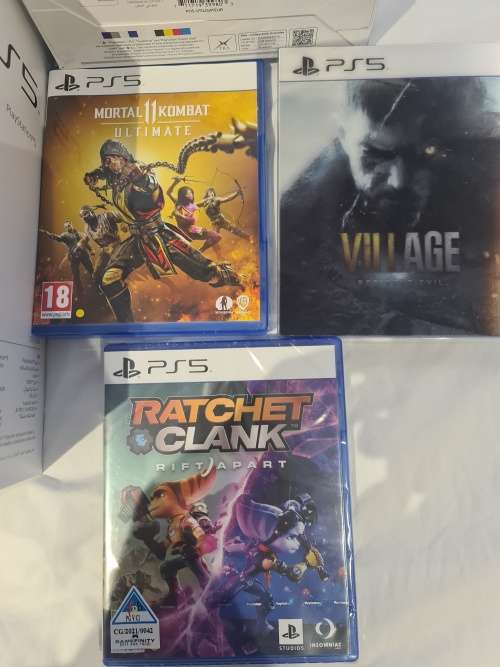 Sony Playstation PS5 Disc Version  STILL BRAND NEW 2 controllers and 3 games under warranty with pop
