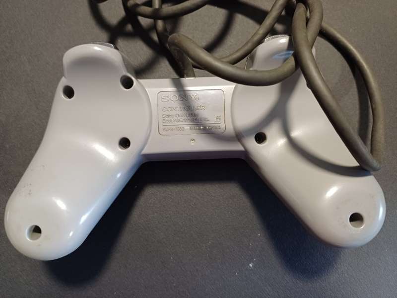 PlayStation 1 (System Complete) plus generic controller