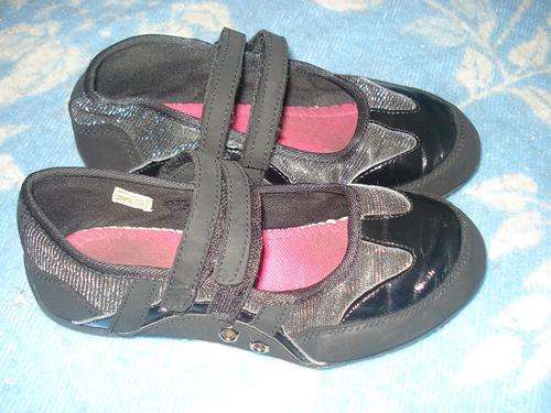 Girls black and silver trainers size 2