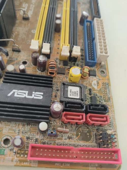 Asus Motherboard +CPU and Cooler**Please read**4 x DDR2 Ram slots**Low Low Shipping