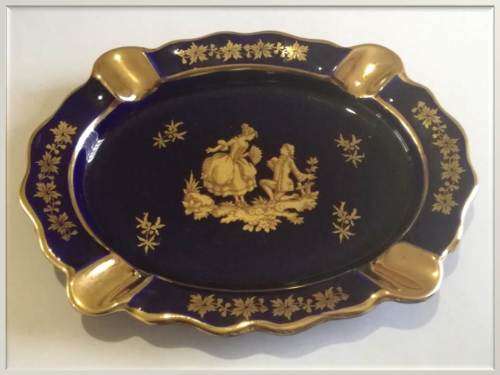 Limoges oval cobalt blue and gilt  `Courting Couple` ashtray