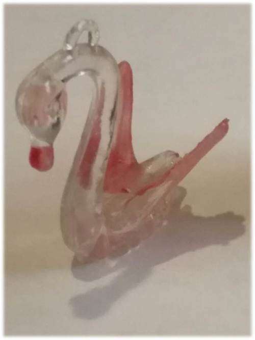 Plastic swan pendant
