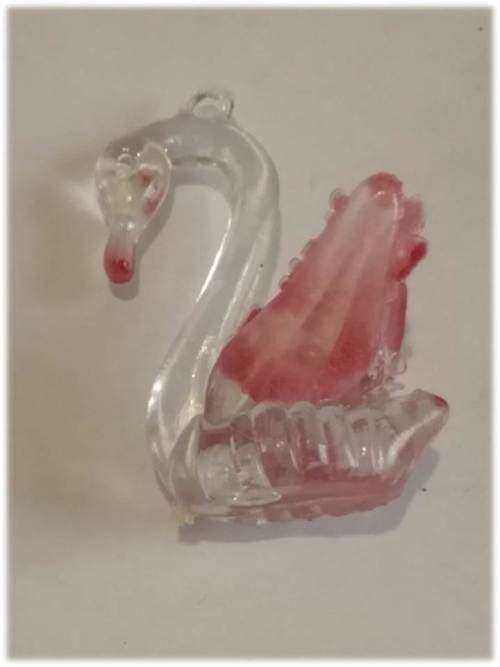 Plastic swan pendant