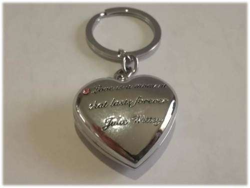 `Ponds` Key rings with engraved quote ` Love is a moment that lasts forever -  Julie Wittey`