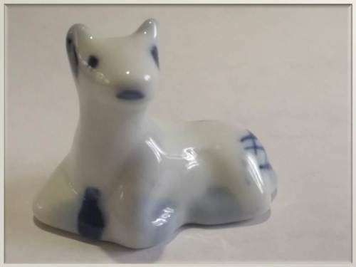 Miniature vintage Delft style porcelain cow